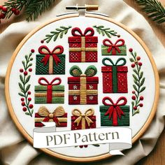 a cross stitch pattern with presents on it and the words pdf pattern written below