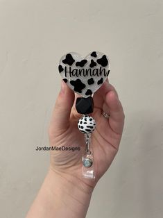 Beautiful Cow Print Badge Reel.  This Animal print retractable badge reel holder is the best choice for ALL.  What a fun accessory to your scrubs, shirt pocket, belt loop, lanyard and more.  They make super fun and useful gifts for any person in any profession.  A great gift choice for nurses, medical staff, office staff, and anyone who is required to wear a badge! 💙 Heart Piece only- means you will only receive the cow acrylic. No reel/Clip will come with it. It's good if you want to glue it to your own reel or pop socket.  Every product is hand made so not all badge reels will be alike. I can also add a name to the badge reel if you would like that. You also have a choice to leave off the beads.  Check out the badge buddy to match! https://www.etsy.com/listing/1315947130/ If you are wan Personalized Black Badge Reel For Personal Use, Black Retractable Badge Holders As Gift, Black Retractable Badge Reel For Gift, Customizable Black Badge Reel, Black Badge Reel With Swivel Clip As A Gift, Beaded Badge Reel, Nursing Badge Reel, Scrubs Shirt, Nursing Badge