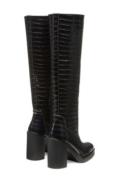 Elevate a wide range of looks with this knee-high boot artisanally crafted in Spain and set on a subtle platform and walkable block heel. 3 3/4" heel 15 1/4" shaft; 15 1/2" calf circumference Side zip closure Leather upper/synthetic linen/leather sole Made in Spain Leather Tall Platform Boots With Stacked Heel, Wide Calf High Shaft Heeled Boots With Reinforced Heel, Knee-high Platform Boots For Work With Reinforced Heel, Knee-high Platform Boots With Reinforced Heel For Work, Workwear Knee-high Platform Boots With Reinforced Heel, Wide Calf Platform Boots With Stacked Block Heel, Heeled Boots With Stacked Heel And High Shaft, Wide Calf Tall Platform Boots With Stacked Heel, Tall Platform Boots With Stacked Heel And Wide Calf