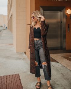 The Beautiful Lisa Marie Prang wearing a Lovestitch super long fuzzy sweater in a rust brown and black zebra stripe fabrication. The insanely soft fuzzy cardigan is worn over a black tank top, distressed denim and Berkenstocks! Brown Knit Outerwear With Pockets, Chic Brown Cardigan With Pockets, Chic Brown Outerwear For Loungewear, Oversized Brown Cardigan For Loungewear, Trendy Brown Sweater Coat For Layering, Chic Brown Open Front Sweater, Brown Soft Knit Cardigan For Loungewear, Brown Cardigan For Fall Loungewear, Chic Brown Knit Outerwear