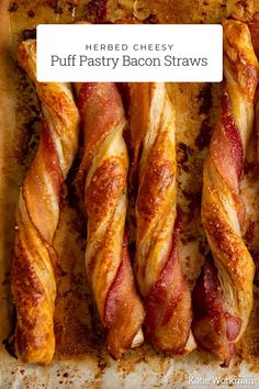 bacon wrapped pretzels on a baking sheet with the words herb cheesy puff pastry bacon straws