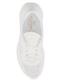 Step out in style with these lightweight and chic sneakers, perfect for any fashion-forward individual. The rubberized Vlogo detail and tonal leather accents add a touch of luxury to this ultra-modern design. With a lace-up closure and ultra-light rubber sole, these sneakers are as comfortable as they are stylish. White lightweight technical mesh Rubberized Vlogo signature detail on tongue Lace-up closure Ultra-light rubber sole | Valentino Garavani Women's True Actress Sneakers in White | Size Women Crafts, Chic Sneakers, Luxe Interiors, Iconic Fashion, Leather Cap, White Mesh, Pumps Flat, Mesh Material, Fendi Bags