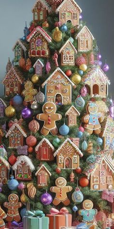 a christmas tree decorated with gingerbread cookies and other holiday decorations, all in different colors