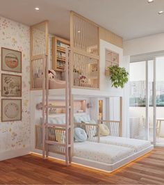 a child's bedroom with bunk beds and wooden flooring in front of a window