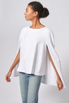 Our Cape Sweatshirt in our Bamboo and Cotton French Terry is the perfect combination of casual and chic. With enough attitude to turn heads, this style pairs well with your favorite jeans or slim trousers. Boatneck shape with facing, cape back detail with longer length, wide hem finish. - 67% Bamboo Rayon, 28% Cotton, 5% Elastin - Made in NYC - Dry Clean or Machine Wash - Our model is 5'9" wearing size S - Chest: 37", Bottom Width: 40, Length: 27 1/4" Orders are processed within three business d Casual Cape-style Top, Chic Cotton Batwing Sleeve Tops, Chic Cotton Top With Batwing Sleeves, Oversized Cape Top In Casual Style, Oversized Casual Cape Top, Casual Cape Tops For Spring, Spring Casual Cape Tops, Silhouette Patterns, Flannel Sweatshirt