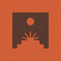 an orange and brown poster with a black square on it's bottom corner that has a sun in the middle