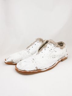 Killer hand painted white canvas slip ons from Comme Des Garçons by Junya Watanabe. Holes and no laces as intended. Made in JapanSize: 7.5/8 (IT 38/39)Era: 1990's 10 1/4”(inside) x 3 7/8”(outside)Includes original box White Low-top Slip-ons With Leather Sole, White Low-top Slip-ons With Stitched Sole, Painted Canvas Shoes, Painted Canvas, Junya Watanabe, White Canvas, Comme Des Garcons, White Painting, Slip Ons