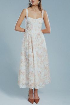 The Lilah Corset Midi Dress has broderie florals overlaid with textural eyelets to enhance the femininity of the design. A corset bodice sheathes the silhouette and is balanced by a contrasting relaxed fit in the midi skirt. Crafted from luxurious ramie, a richly textured, natural fabric that has a lustrous sheen, this is a day-to-night staple.Fitted corset bodice. Relaxed full midi skirt.Boning detail in the corset bodiceSide pockets on skirtBody fully lined100% Polyester; Lining: 100% Cotton; Embroidery: 100% CottonCold hand wash separately inside out, reduced spin, do not bleach, rub, soak or wring, do not tumble dry, dry in shade, cool iron on reverse side if required, dry cleanable, avoid rough surfaces as this may damage fabric. Casual White Dresses, Fitted Corset, Full Midi Skirt, Corset Midi Dress, Day To Night Dresses, Yellow Midi Dress, Midi Dress Style, Corset Bodice, Natural Fabric