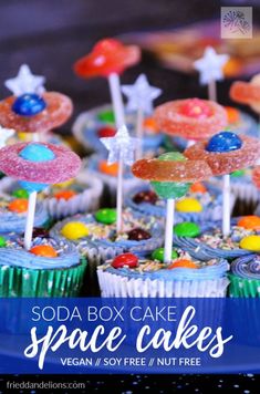 some cupcakes that are sitting on top of each other with the words, soda box cake space cakes vegan / soy free and nut free