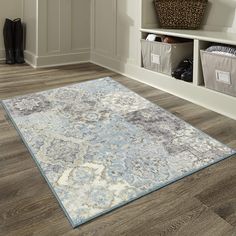 a large area rug in the middle of a room