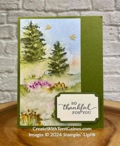 a card with some trees on it