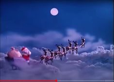 santa's sleigh is being pulled by his reindeers through the sky