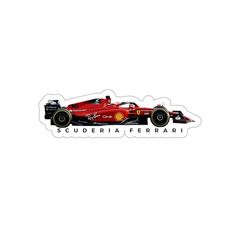 a red race car sticker with the words scuderia ferrari written on it