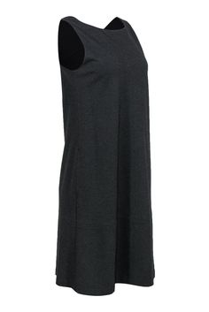 Simple can sometimes make a statement when you wear this soft knit beauty from Eileen Fisher! Made with a shapeless shift silhouette, this is a versatile piece to wear with all your favorite jackets and more! How you wear it is up to you! Size XS 71% Viscose, 24% Nylon, 5% Spandex Shift silhouette Rounded neckline Fully lined Material provides stretch No closures Waist 36" Bust 27" Total length 39.5" Eileen Fisher, Soft Knits, Dresses Xs, Round Neckline, Shift Dress, Little Black Dress, Knitting, Grey, How To Wear