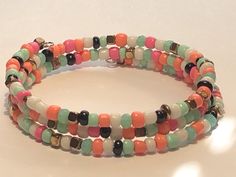 Here's a fun memory wire beaded bracelet I just made.  It could be yours! Wire Wrap Bracelets, Stretch Beaded Bracelets Diy, Memory Wire Wrap Bracelets, Beaded Memory Wire Bracelets, Beaded Memory Wire, Wire Bracelets, Fun Bracelet, Memory Wire Bracelet, Bracelets Diy