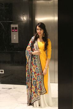 Check out this post - Back in time with the colorful phulkari; and add the glow with yellow  created by Tanya Sethi and top similar posts, trendy products and pictures by celebrities and other users on Roposo. Casual Salwar Suit, Punjabi Embroidery, Chudi Neck Designs, Yellow Kurti, Salwar Neck Designs