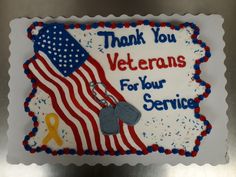 a cake decorated with an american flag and the words thank you veterans for your service