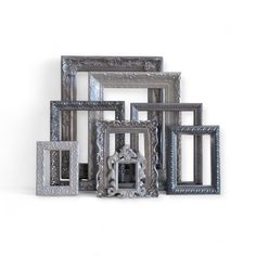 several frames are stacked on top of each other in different styles and sizes, all with ornate designs