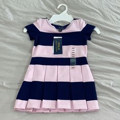 Nwt Polo Ralph Lauren 2t Pink And Navy Blue Dress. Get It In Time For Christmas! Pink Preppy Cotton Dress, Cute Navy Short Sleeve Dress, Navy Fitted Cute Dress, Cute Fitted Navy Dress, Preppy Pink Dress For Spring, Preppy Pink Spring Dress, Navy Blue Dress, Ralph Lauren Dresses, Ralph Lauren Dress