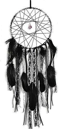 a black and white dream catcher with feathers