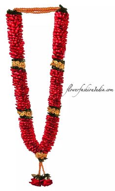 a long red beaded necklace with gold accents