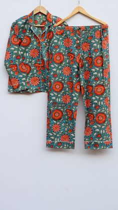 Designed and customized in our India store, the love and care we put into every PJ will stand out to you at the moment you see it. Full sleeve shirt with buttons and loose fit trousers. Completely handmade in Jaipur from 100% pure cotton fabric. Comes in S/M/L/XL sizes, but without any complications can be adjusted to individual measurements. Note: The color and brightness of actual product may vary due to digital photography and photo editing. We crossed check each and every product before list Multicolor Cotton Loungewear Sets, Multicolor Cotton Lounging Sets, Green Cotton Sleepwear For Overnight, Green Printed Sets For Sleepovers, Green Cotton Pant Set For Loungewear, Womens Pj Sets, Loose Fit Trousers, Full Sleeve Shirt, Bridesmaid Pajama Set