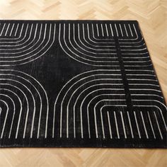 a black rug with white lines on it