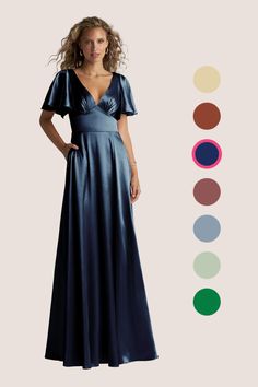 a woman in a long blue dress standing next to color swatches and the colors below her