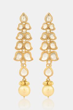 Elevate your elegance with our Kundan Earrings, showcasing beautifully crafted kundan motifs in a unique pattern, accentuated with a pearl drop for a contemporary touch. Crafted with precision, these earrings make a stunning statement for any occasion Finish: 22KT Gold Plating Material: Silver, Copper Alloy, Kundan Color: Gold Size: One Size Closure Type: Push Back Box Contains: 1 Pair of Earrings Pearl Drop Earrings For Reception, Elegant Kundan Chandelier Earrings With Pearl Drop, Elegant Pearl Drop Danglers For Reception, Elegant Kundan Pearl Drop Earrings, Kundan Bridal Earrings With Pearl Drop For Formal Occasions, Elegant Kundan Danglers For Celebration, Formal Kundan Bridal Earrings With Pearl Drop, Elegant White Kundan Earrings, Elegant Pearl Meenakari Earrings For Diwali