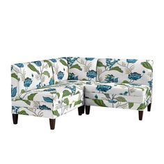 a blue and white floral print sectional sofa