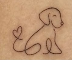 a drawing of a dog with a heart on it's chest is shown in black ink