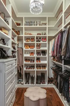 the closet is full of shoes and clothes