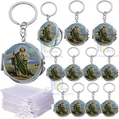 a set of twelve key chains with pictures of jesus and mary on them, all in different styles