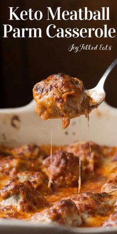 a spoon full of meatball parm casserole