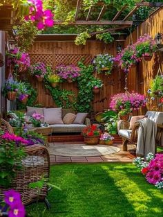 an outdoor living area with lots of flowers