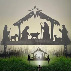 a nativity scene with the birth of jesus and three wise men in silhouettes