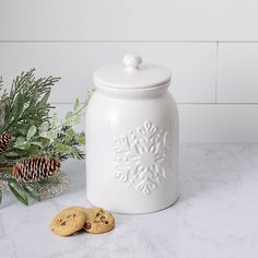 a cookie jar sitting on top of a white counter