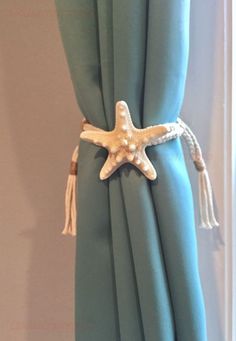 the starfish is attached to the curtain