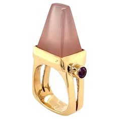 Simply Beautiful! Finely detailed Rose Quartz and Diamond Vintage Gold Ring. Centering a securely nestled Hand set Pyramid Rose Quartz, weighing approx. 6 Carats. Accented by Amethyst, weighing approx. 0.40tcw. Approx. dimensions: 1.52” l x 0. 91” w x 0.52” h. Hand crafted 14K Yellow Gold mounting, featuring a European shank. Size 6.5, we offer ring re-sizing. The ring is in excellent condition and was recently professionally cleaned and polished. Unique and Fabulous as you are… More Beautiful in real time! Sure to be admired…illuminating your look with Timeless Beauty! Vintage Gold Ring, Ring Aesthetic, Vintage Gold Rings, Amethyst Gold, Aesthetic Movement, Rose Ring, Vintage Diamond, Simply Beautiful, Cocktail Rings