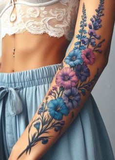 a woman's arm with flowers on it