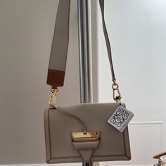 Loewe Barcelona Leather Shoulder Bag ; 9.5”X6.5”X3.5”, One Back Slip Pocket, 3 Compartments Interior, Removable Shoulder/ Crossbody Strap Drop 19”( 2”Width). New W/ Tag, Dust Bag. Retail $2695 Luxury Cream Rectangular Shoulder Bag, Designer Cream Shoulder Bag, Designer Rectangular Cream Shoulder Bag, Designer Cream Rectangular Shoulder Bag, Designer Cream Square Shoulder Bag, Loewe Gate Bag, Loewe Bags, Loewe Puzzle, Soot Sprites