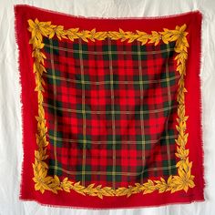 Celebrate the holiday season in style with this vintage Blumarine wool plaid Christmas scarf. Hailing from the 90s, this cozy winter knit shawl features a charming red, green, and gold leaves print, perfect for adding a festive touch to your wardrobe. The fringe edges add a delightful cottagecore vibe, making it an ideal accessory for both casual and dressy occasions. Crafted from high-quality wool, this scarf ensures warmth and comfort during the colder months while exuding a nostalgic charm th Blumarine Vintage, Vintage Blumarine, Cottagecore Gifts, Christmas Scarf, Knit Shawl, Leaves Print, Gold Leaves, Knitted Shawls, Plaid Christmas