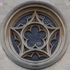 the circular window has an intricate design on it