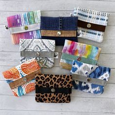 This mini womens wallet is perfectly sized for credit cards, IDs or business cards, featuring one card pocket in front and one behind the zippered change pocket. The snapped fold-over closure allows for easy access, but still keeps your items secure. Slim and compact, this wallet easily slips into your handbag, fanny pack, belt bag,  or pocket. Key Features: * Accent tab with metal snap closure, for long lasting durability and to keep everything safely secured inside. * Dedicated front card slot Multicolor Rectangular Badge Holder With Card Slots, Trendy Everyday Trifold Wallet, Trendy Trifold Wallet For Everyday Use, Trendy Rectangular Trifold Wallet For Everyday Use, Rectangular Badge Holder With Card Slots, Rectangular Badge Holder With Card Slots For Everyday Use, Everyday Rectangular Card Holder With Zipper, Versatile Rectangular Trifold Wallet As Gift, Womens Wallet