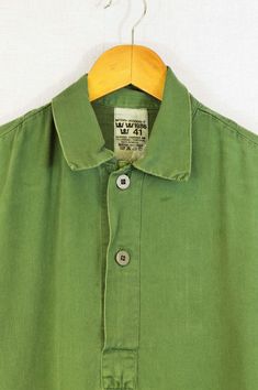 "True vintage Swedish military smock tops from the 1960s-80s, made from a soft cotton with grandad style button down neckline, button cuffs and curved hem. We only have a very small batch of these with no chance of re stock right now, so quantities are limited. - Soft worn in cotton - Loose, comfy fit - Dip hem design - True vintage from the Swedish army - Fabric is 100% cotton SIZING XS - fits chest 34\" Small - fits chest 36\", Medium - fits chest 38\"-40\", Large - fits chest 42\"-44\" XL - f Smock Tops, Vintage Henley, Swedish Army, Capri Trousers, Work Trousers, Smock Top, Chore Jacket, 60s Fashion, Small Batch