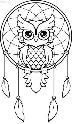 an owl sitting on top of a dream catcher