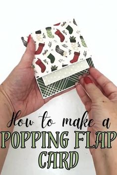 two hands holding up a card that says how to make a popping flap card