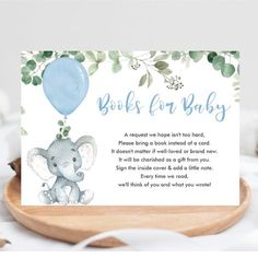 a card with an elephant holding a blue balloon