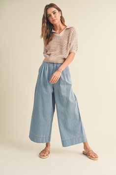 Introducing the Marcie Wide Leg Cropped Pant - your new wardrobe must-have. With its flattering wide leg fit and cropped length, this denim pant offers both comfort and style. Plus, the smocked waist in the back provides a perfect, customized fit. Complete with pockets and a button zipper closure, it's a no-brainer! Cropped Denim Pants, Collared Top, Stylish Pants, Summer Inspo, Wide Leg Cropped Pants, Crop Top Sweater, Crop Pants, Leg Design, Washed Denim