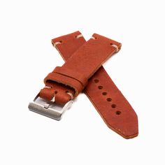 This handcrafted leather watch strap is the epitome of rugged luxury. Made by expert leather-crafters in the southeastern U.S., it is the perfect complement to any watch, forging the ideal union of form and function. As with any quality full grain leather product, your unique use of the strap will change its shape, color, and texture over time. You are not only buying a watch strap – you are embarking on a journey to create something unique and personal over the coming months and years.   The full grain bovine leather comes from the renowned Horween Leather Company in Chicago. Honing their craft since 1905, Horween uses old world techniques coupled with proprietary processes and their own formula of natural oils and greases to create a work of unmatched durability and natural beauty.    Tw Horween Leather, Leather Product, Leather Company, Leather Watch Strap, Handcrafted Leather, Watch Strap, Natural Oils, Full Grain Leather, Old World